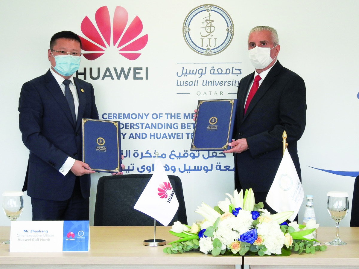 Professor Nitham Hindi (right), Lusail University Provost and Zhao Liang (left), CEO of Huawei Gulf North at MoU signing ceremony.
