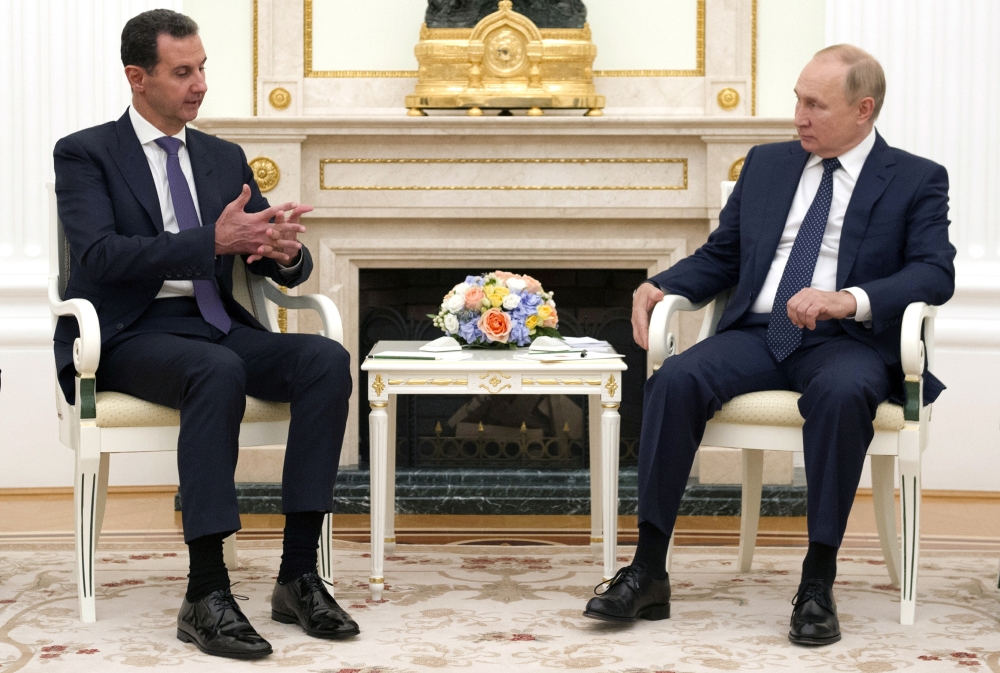 Russian President Vladimir Putin attends a meeting with Syrian President Bashar al-Assad at the Kremlin in Moscow, Russia, September 13, 2021.  Sputnik/Mikhail Klimentyev/Kremlin 