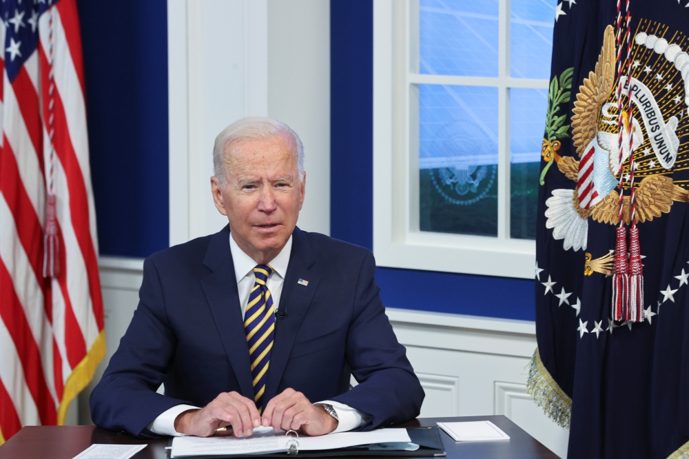 U.S. President Joe Biden participates in a meeting of the Major Economies Forum on Energy and Climate (MEF) on climate change, from an auditorium at the White House in Washington, U.S. September 17, 2021. REUTERS/Jonathan Ernst