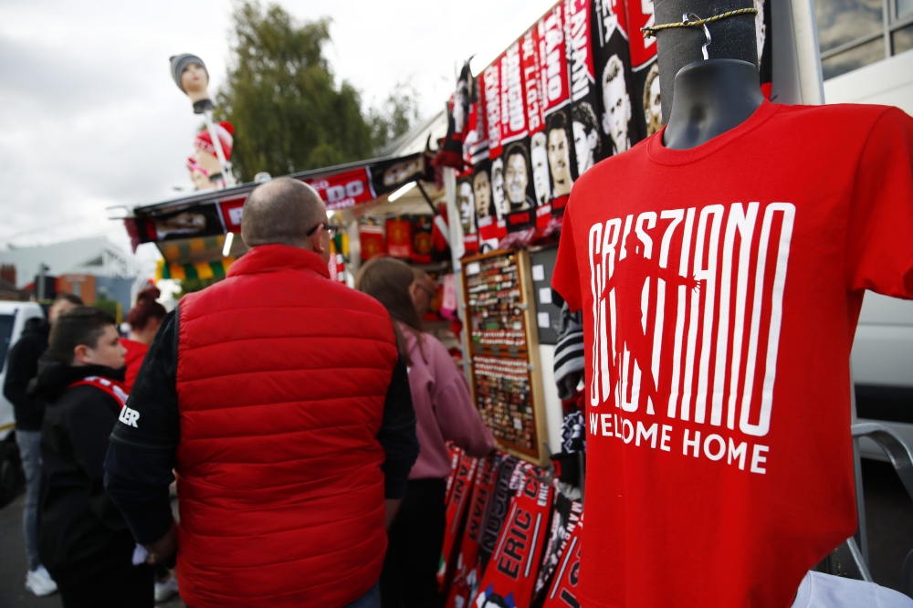 General view of Manchester United's Cristiano Ronaldo merchandise for sale outside the stadium before the match Action Images via Reuters/Jason Cairnduff 