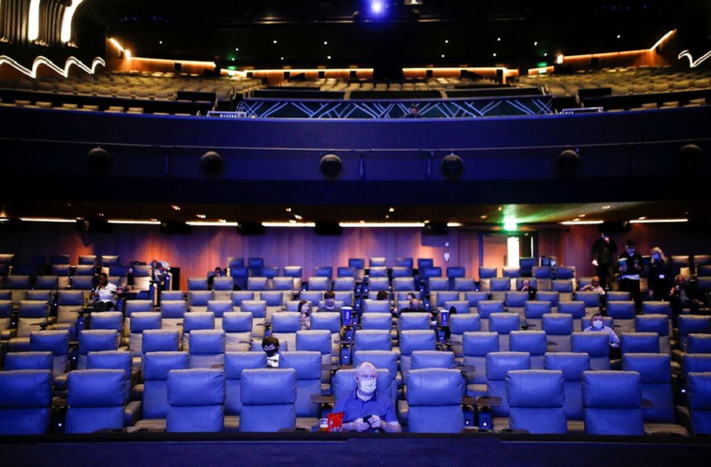 People take their seats inside the Odeon Luxe Leicester Square cinema, on the opening day of the film 