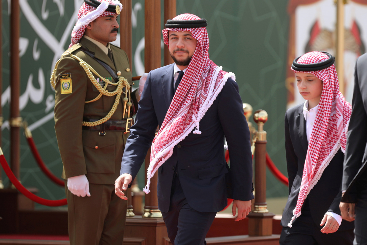 FILE PHOTO: Jordan's Crown Prince Hussein and his brother Prince Hashem attend a ceremony celebrating the country's 73rd Independence Day in Amman, Jordan, May 25, 2019. REUTERS/Muhammad Hamed/File Photo
