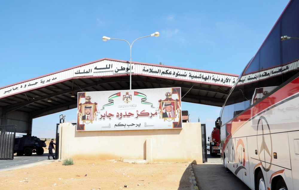 A bus waits at Jaber border crossing with Syria, near Mafraq, Jordan, September 29, 2021.REUTERS/Alaa Al Sukhni