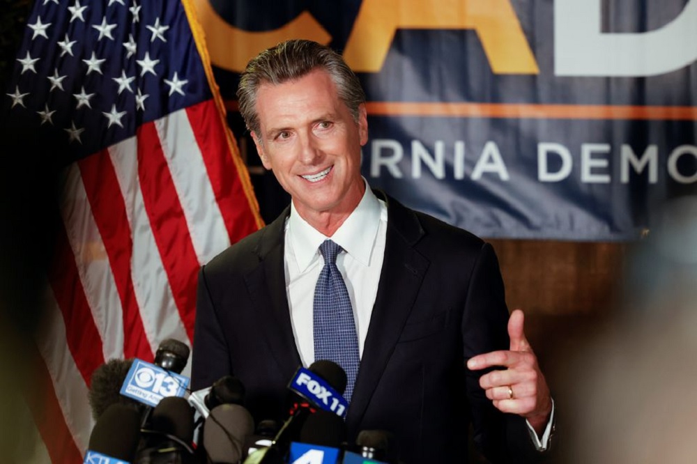 California Governor Gavin Newsom speaks after the polls close on the recall election, at the California Democratic Party headquarters in Sacramento, California, U.S., September 14, 2021. REUTERS/Fred Greave
