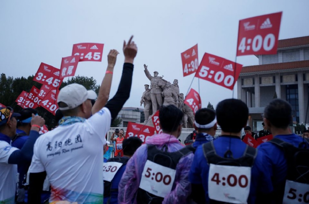 Staff members gather at Tiananmen Square before the start of the annual Beijing Marathon in Beijing, China November 3, 2019. REUTERS/Jason Lee