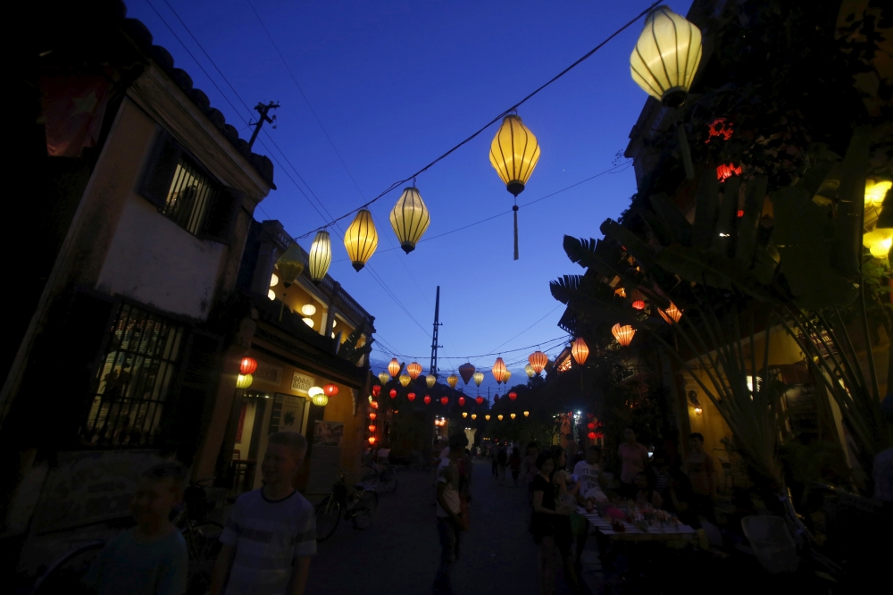 Lanterns hang on a street in Vietnam's central ancient town of Hoi An, a UNESCO heritage site June 25, 2015. Photo taken on June 25, 2015. REUTERS/Kham/File Photo