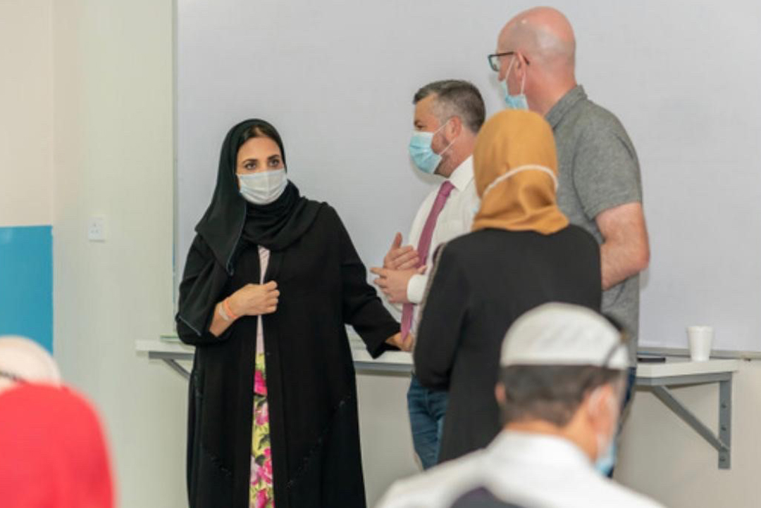 Chairperson and Founder of Doha Academy schools and the Al Faleh Educational Holding Dr. Sheikha Aisha bint Faleh Al Thani interacting with staff during her visit to a school of Doha Academy.