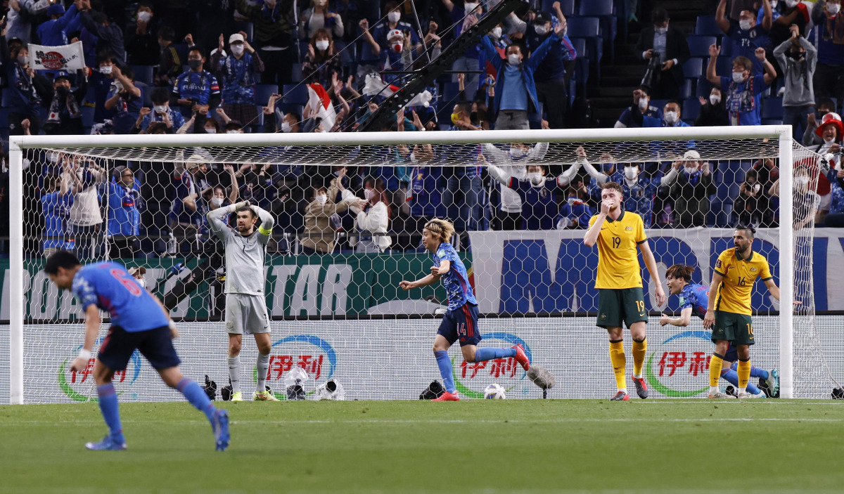 Australia's Aziz Behich looks dejected after scoring an own goal and Japan's second REUTERS/Kim Kyung-Hoon
