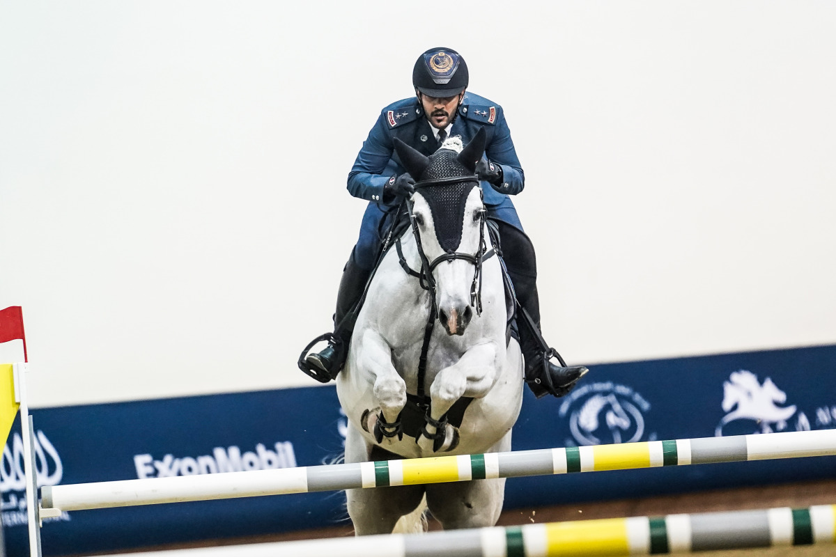 Mohammed Saeed Haidan guides Miss Chili over a hurdle.