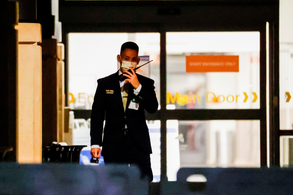 A security personnel stands guard at the University of California Irvine Medical Center after it was announced that the former U.S. President Bill Clinton was admitted to the hospital in Orange, California, U.S. October 15, 2021. REUTERS/Ringo Chiu