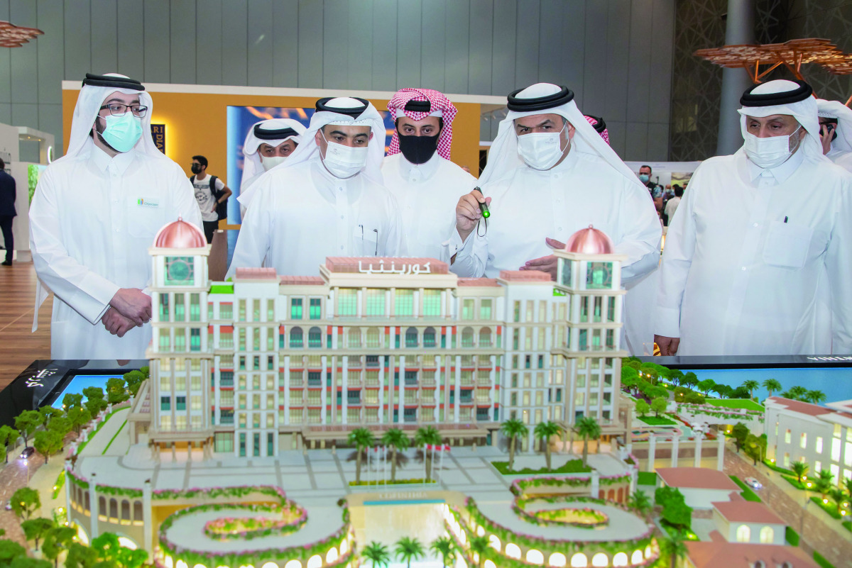 Minister of Commerce and Industry and Acting Minister of Finance H E Ali bin Ahmed Al Kuwari with Chairman of UDC, Turki bin Mohammed Al Khater, and President, CEO and Member of The Board at UDC Ibrahim Jassim Al Othman at the opening of Cityscape Qatar, 