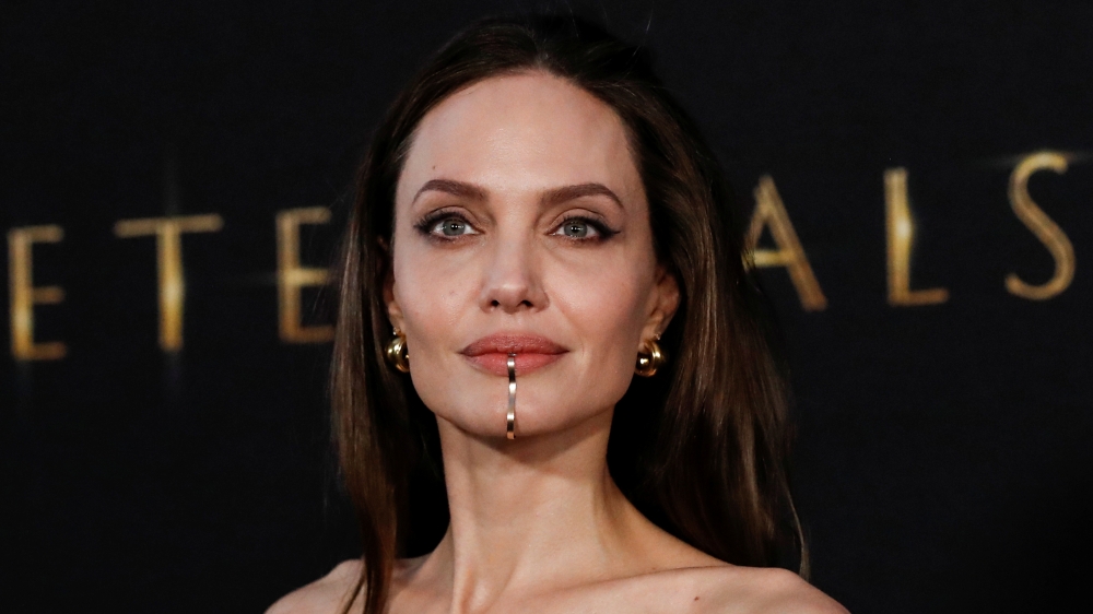 Cast member Angelina Jolie poses at the premiere for the film 