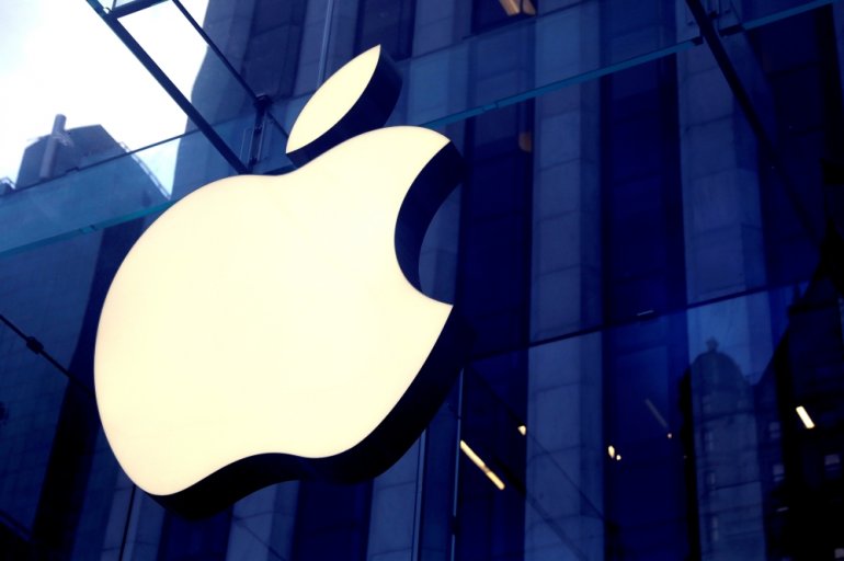 The Apple Inc logo is seen hanging at the entrance to the Apple store on 5th Avenue in Manhattan, New York, U.S., October 16, 2019. REUTERS/Mike Segar/File Photo
