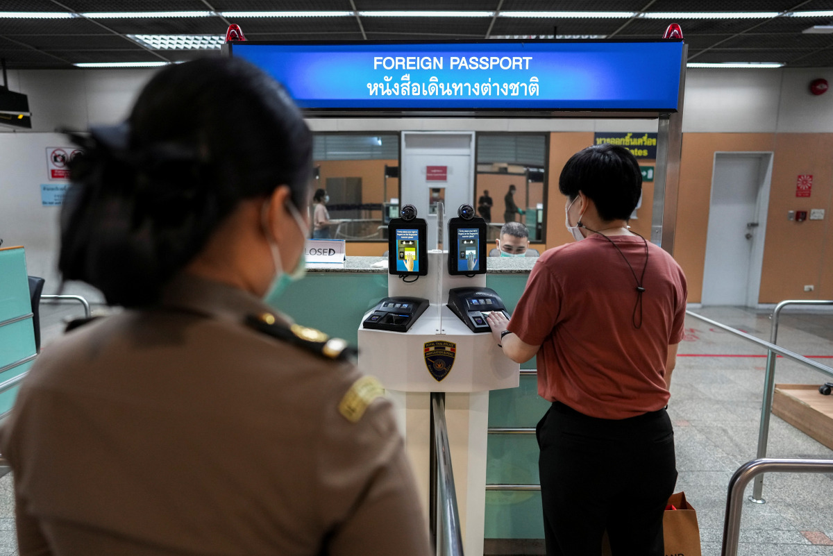 An airport staff practices departure protocols during a readiness inspection in preparation for the country's reopening on November 1, at Don Mueang International Airport in Bangkok, Thailand, October 20, 2021. REUTERS/Athit Perawongmetha
