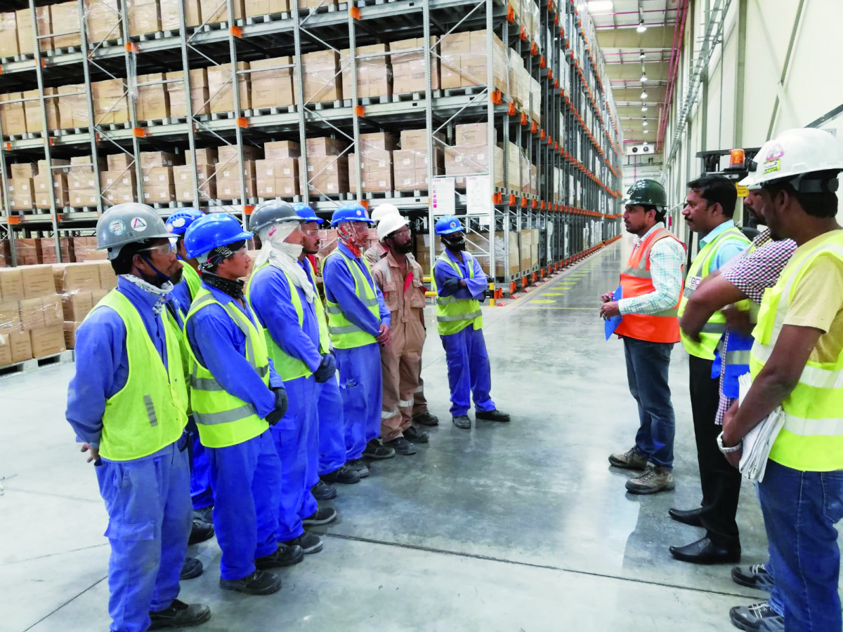 The employees of Mekdam Holding Group in its manufacturing unit.