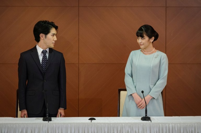 Japan's Princess Mako and her husband Kei Komuro attend a news conference to announce their wedding at Grand Arc Hotel in Tokyo, Japan, October 26, 2021. Nicolas Datiche/Pool via Reuters