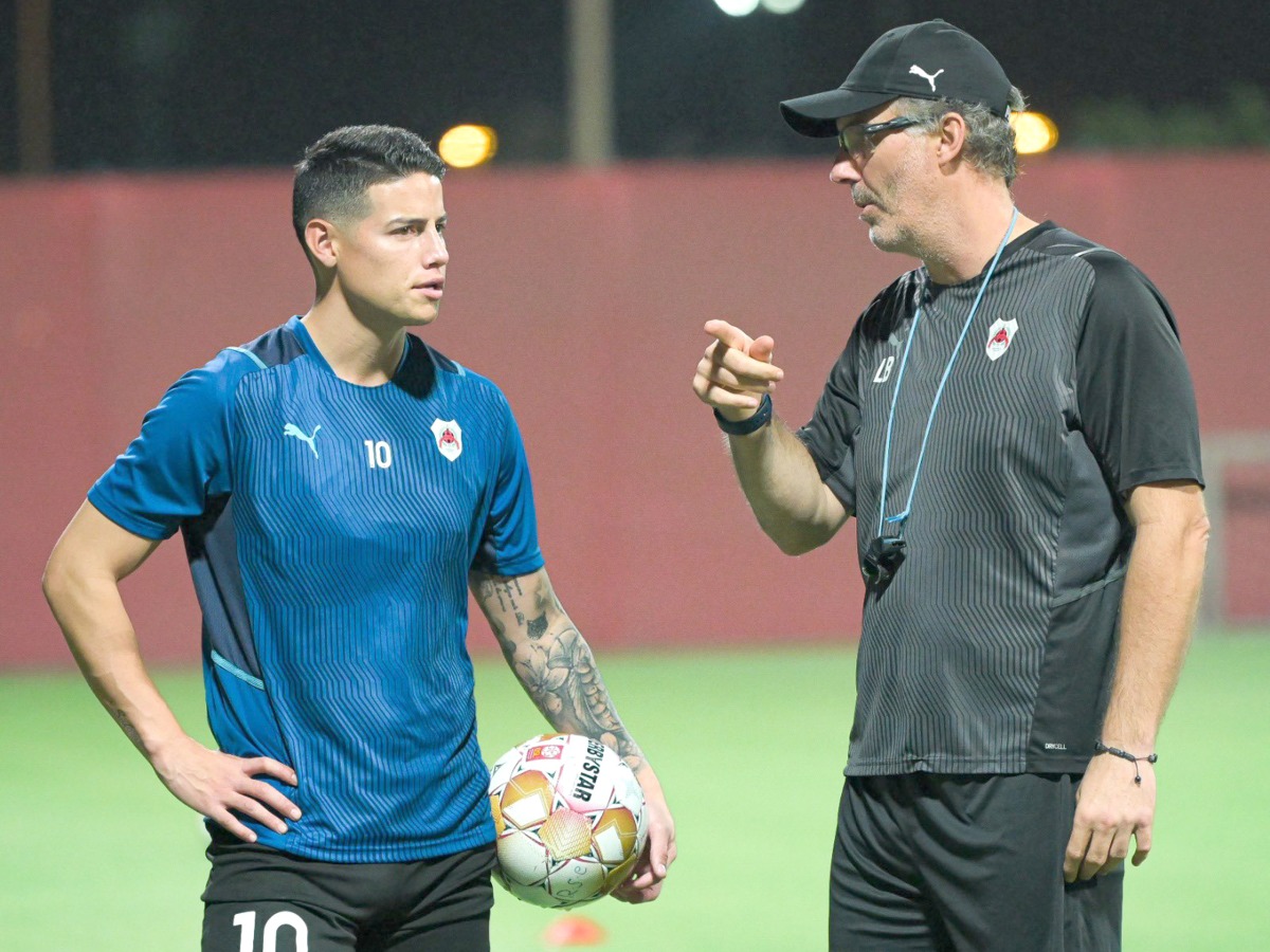 Al Rayyan coach Laurent Blanc with Colombian midfielder James Rodríguez during a training session. Pic: Al Rayyan