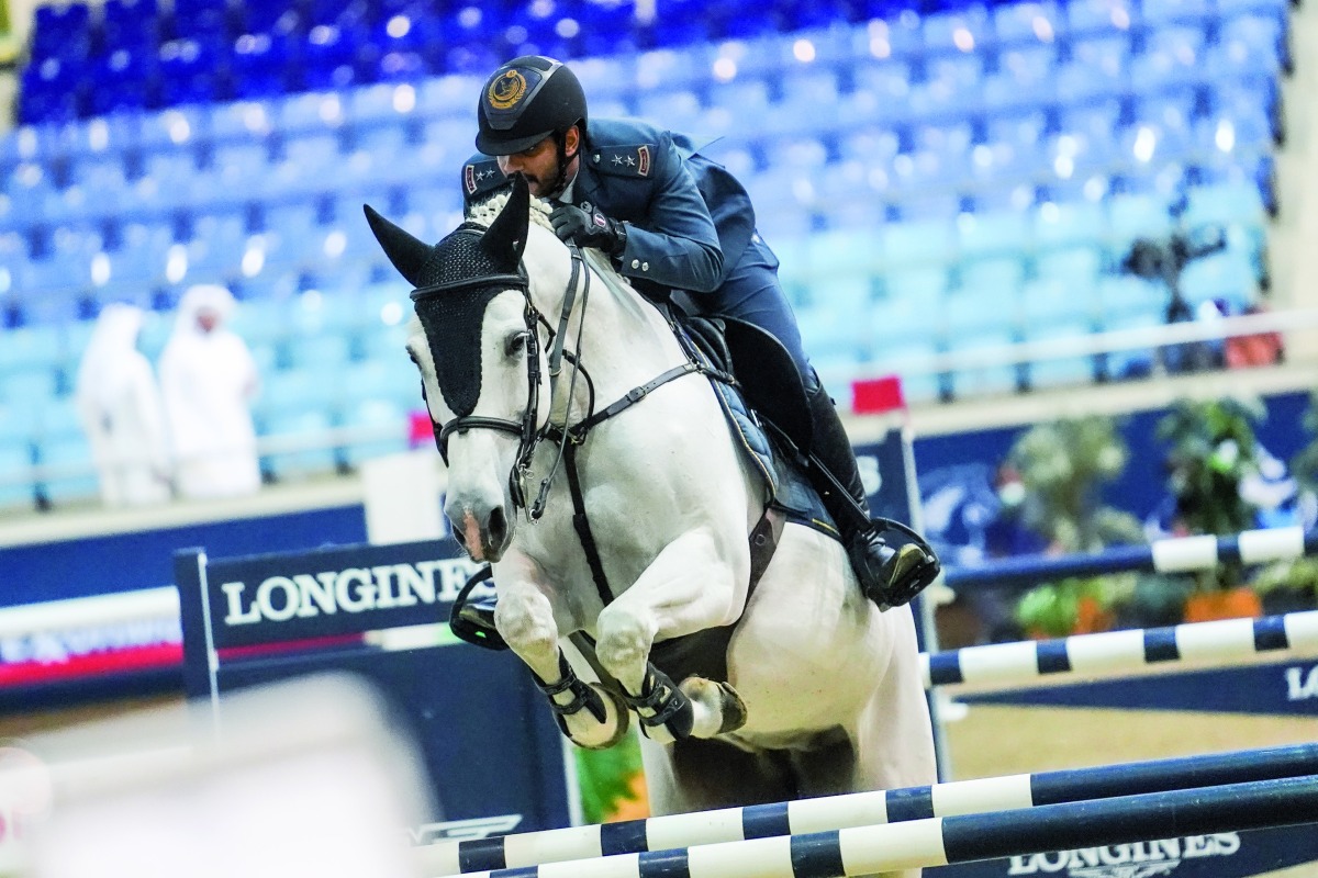 Big Tour winner Mohammed Saeed Haidan guides Miss Chili over a hurdle yesterday.