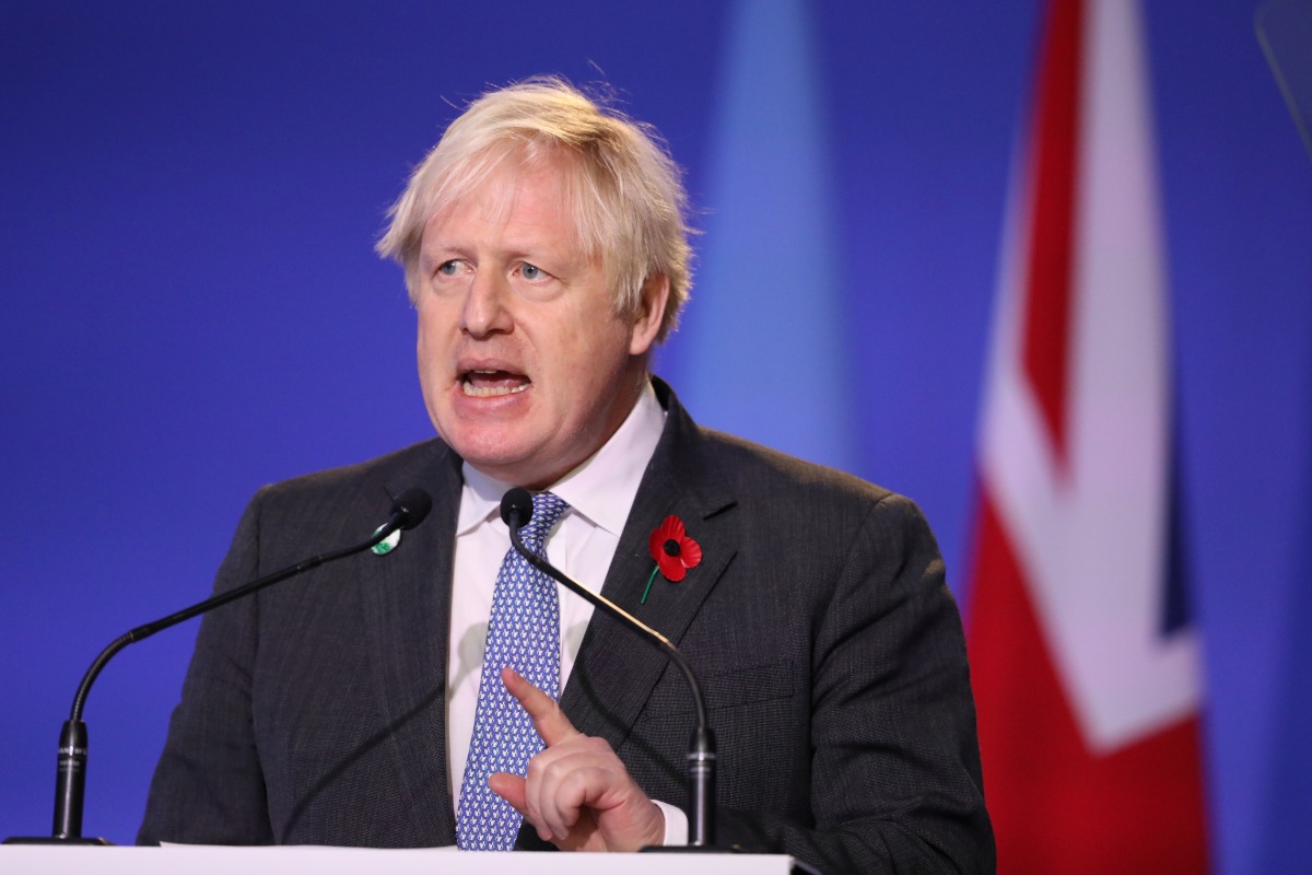 British Prime Minister Boris Johnson speaks during the opening ceremony of the UN Climate Change Conference (COP26) in Glasgow, Scotland, Britain November 1, 2021. Steve Reigate/Pool via REUTERS
