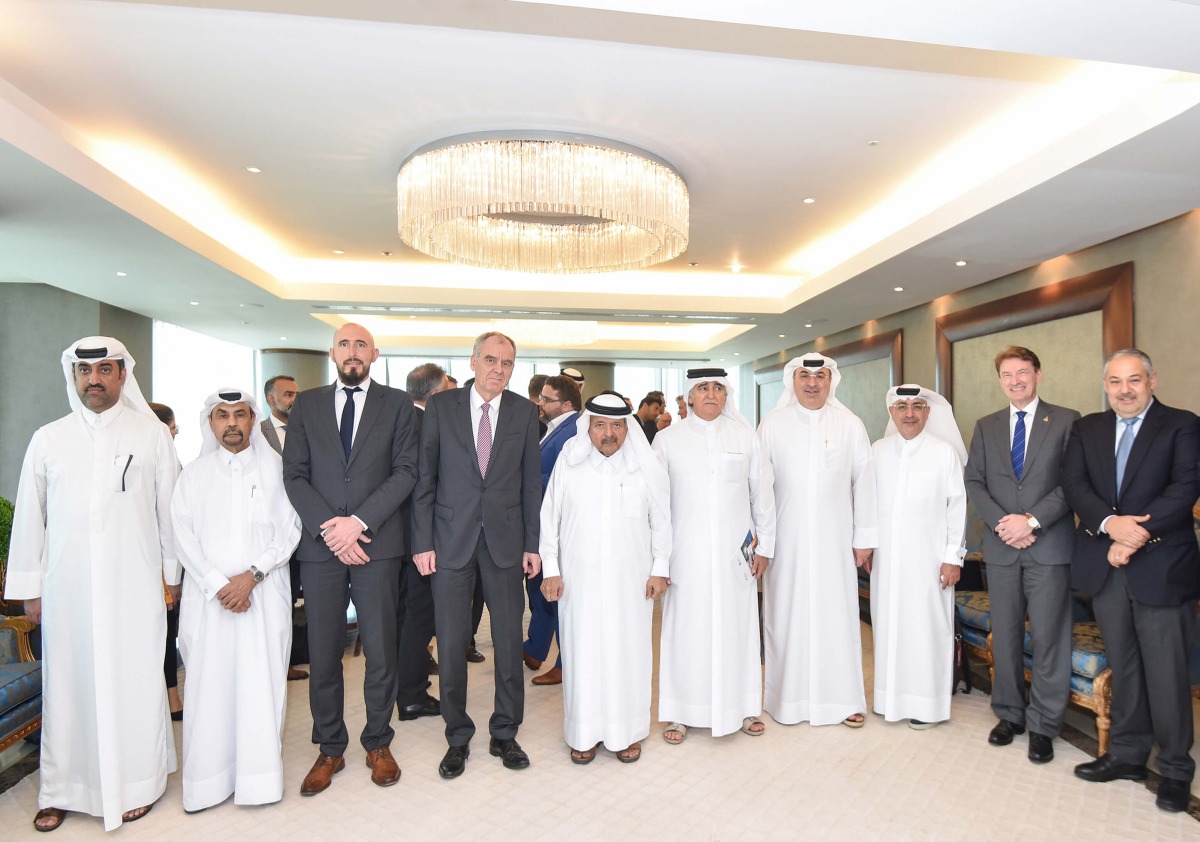 Chairman of QBA Sheikh Faisal bin Qassim Al Thani; Ambassador of the Federal Republic of Germany to Qatar H E Dr. Claudius Fischbach; members of QBA and members of the delegation of German companies posing for a photo.