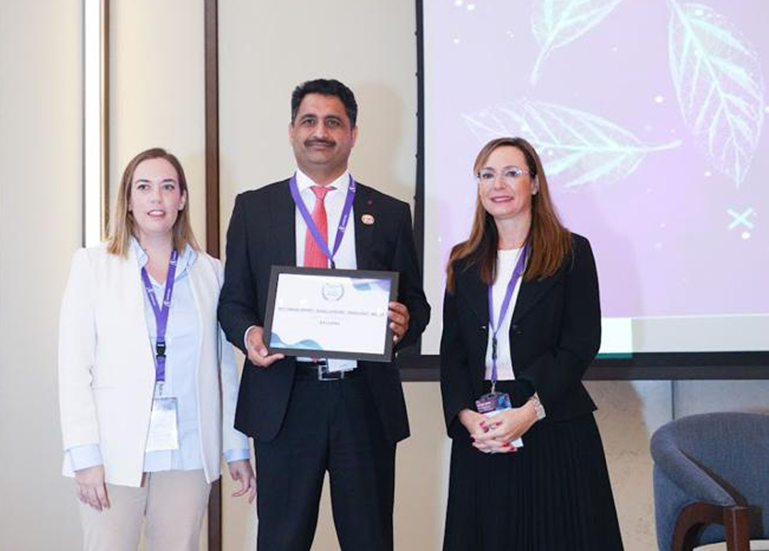 Saifullah Khan (centre), CFO at Baladna, receives the company's awards at the 2021 MEIRA IR Awards, recently.