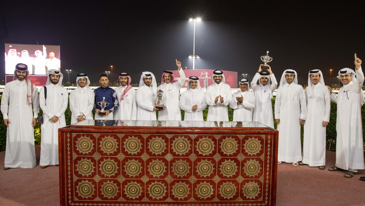 Bader Mohammed Al Darwish, Qatar Racing &  Equestrian Club's Acting CEO, with the connection of Nakheel, winners of Al Beshairiya Cup yesterday.
