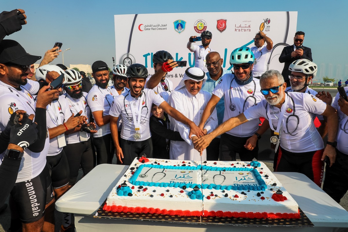 Secretary General of QRCS, Ali bin Hassan Al Hammadi with participants during the honouring ceremony. 