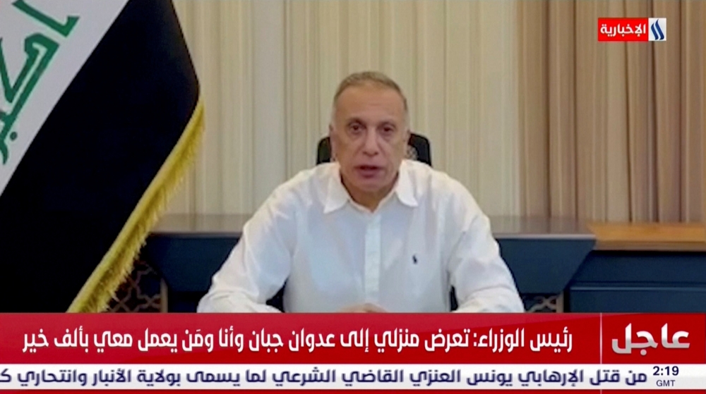 Iraqi Prime Minister Mustafa Al-Kadhimi addresses the nation following a drone strike targeted his residence in Baghdad, Iraq November 7, 2021 in this still image obtained from a video. Al-Iraqiya/Reuters TV/ via Reuters
