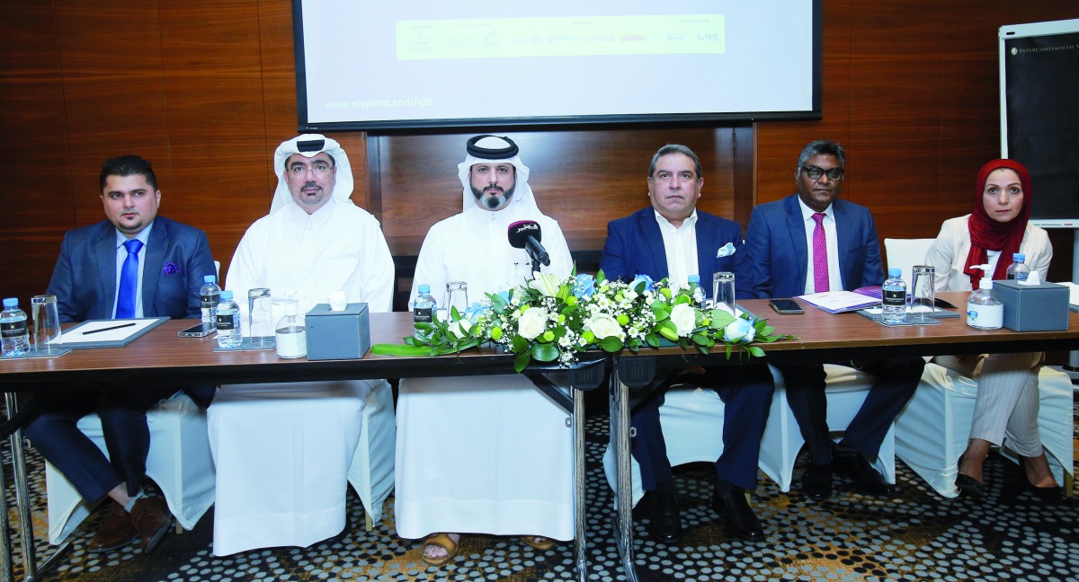 Saif AlKuwari, Assisstant Director of NPCS, Ministry of Commerce and Industry, Hussein Al Abdullah, EGM and Chief Marketing Officer, Commercial Bank, Nadeem Mian, Chief Commercial Officer, QTerminals, and Narendra Kumar, Managing Director, Nispana Global, with other officials during a press confrence, yesterday.
