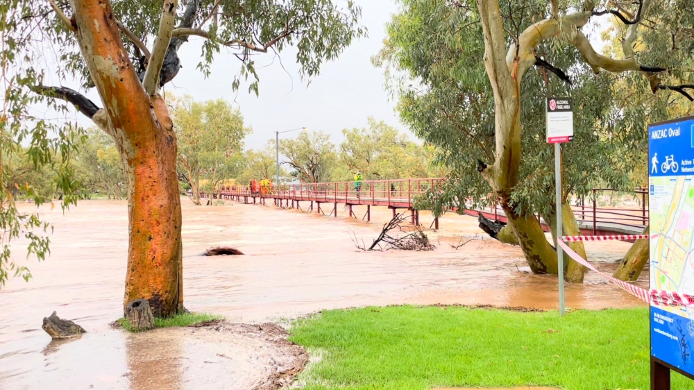 General view of the swelling Todd River in Alice Springs, Australia's Northern Territory, Australia, November 10, 2021, in this still image taken from video provided on social media. Alice Woods/via Reuters 
