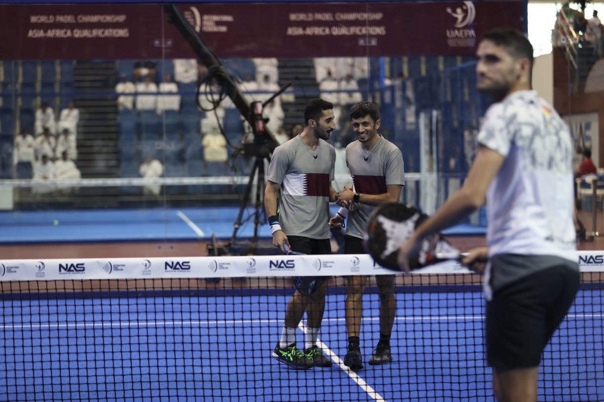 Qatar players celebrate after winning their semi-final match on Thursday.