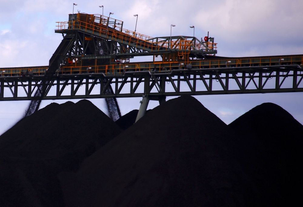 Coal is unloaded onto large piles at the Ulan Coal mines near the central New South Wales rural town of Mudgee in Australia, March 8, 2018. Picture taken March 8, 2018. REUTERS/David Gray/File Photo