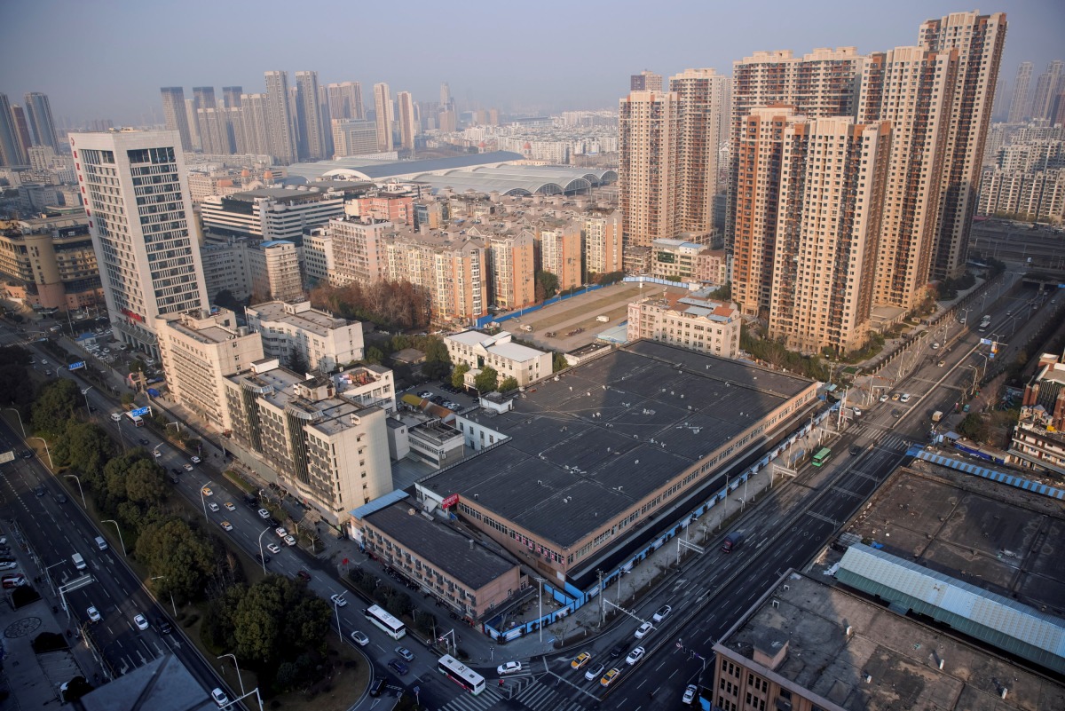 FILE PHOTO: A general view shows the Huanan Wholesale Seafood Market, where the first cluster of cases of the coronavirus disease (COVID-19) emerged, in Wuhan, Hubei province, China, January 15, 2021. REUTERS/Thomas Peter/File Photo
