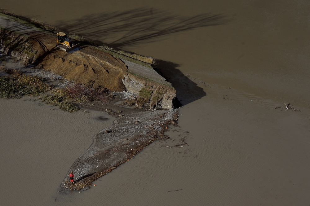 A broken dyke is seen after rainstorms lashed the western Canadian province of British Columbia, triggering landslides and floods, shutting highways, in Abbottsford, British Columbia, Canada November 19, 2021. REUTERS/Jennifer Gauthier