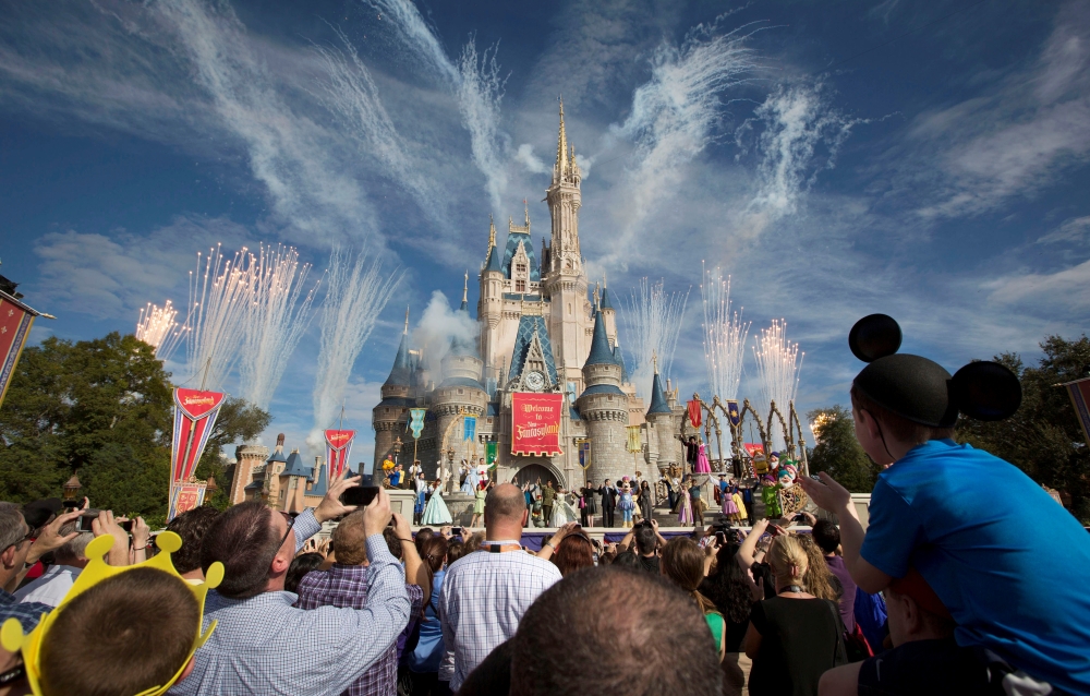 Fireworks go off around Cinderella's castle during the grand opening ceremony for Walt Disney World's Fantasyland in Lake Buena Vista, Florida December 6, 2012. REUTERS/Scott Audette/File Photo