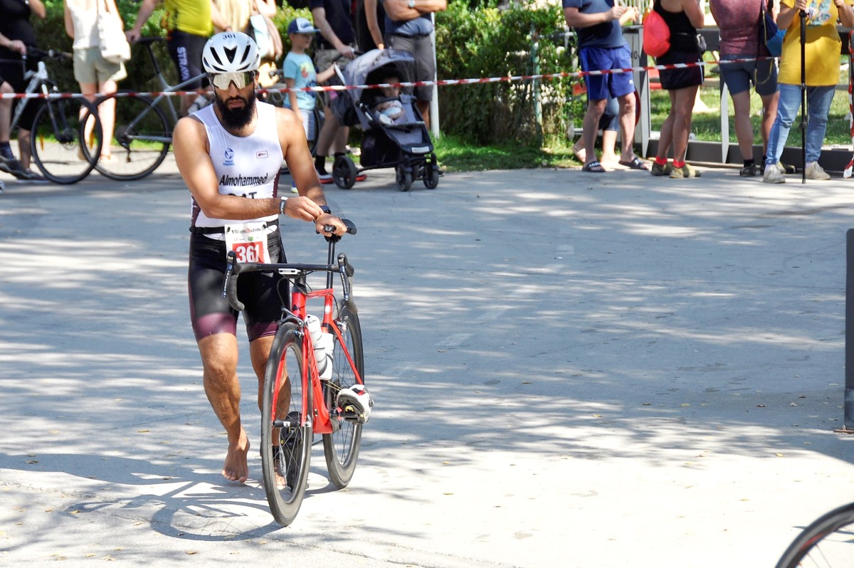Fahad Al Mohammed makes the transition from swim to bike at Lake Bled Triathlon in Slovenia in this file photo.