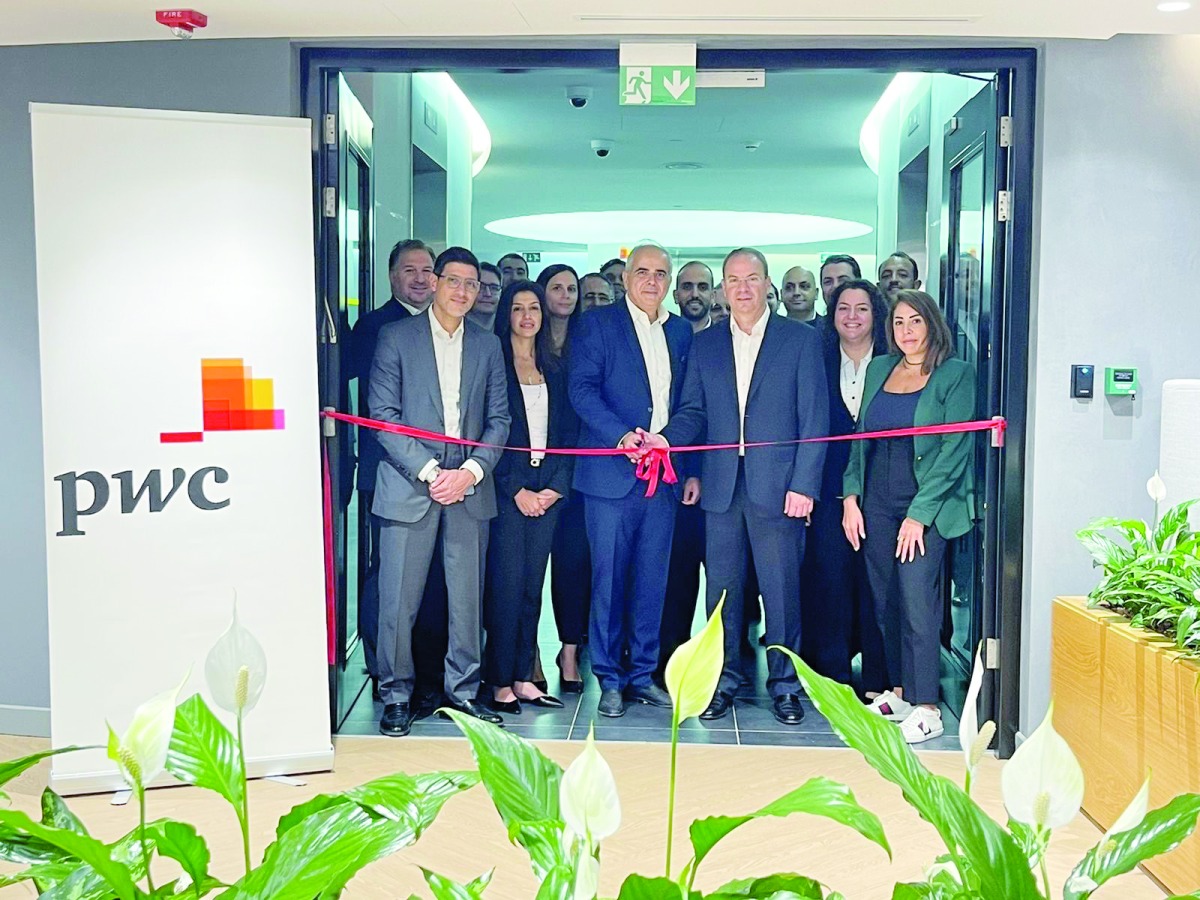 Bassam Hajhamad, Qatar Country Senior Partner at PwC Middle East, with other PwC consultants and experts, at the newly expanded office, recently. 