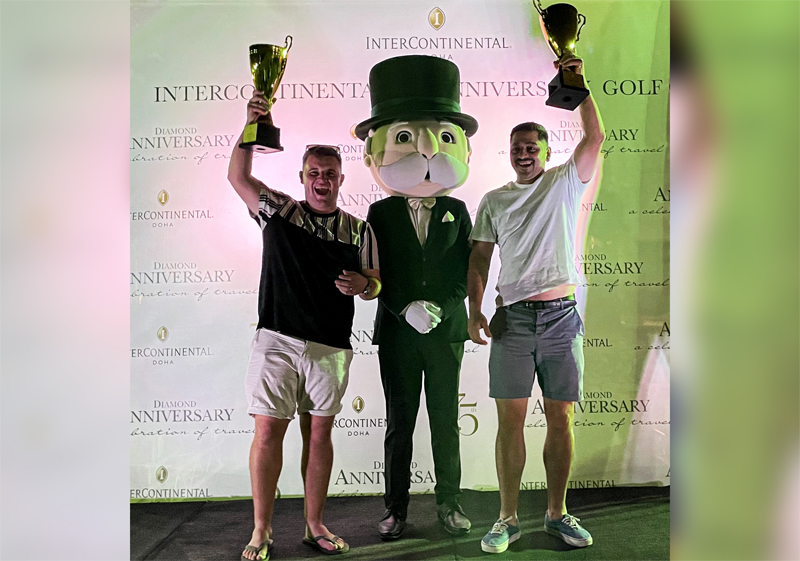 Winners of InterContinental’s 75th Anniversary Golf Open pose for a photo with Mr. Monopoly, at the Doha Golf Club, recently. 