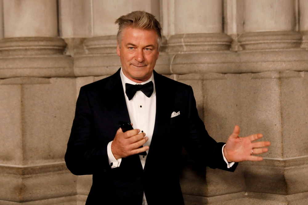 Actor Alec Baldwin gestures before walking on the red carpet during the commemoration of the Elton John AIDS Foundation 25th year fall gala at the Cathedral of St. John the Divine in New York City, in New York, U.S. November 7, 2017. REUTERS/Shannon Stapleton/File Photo