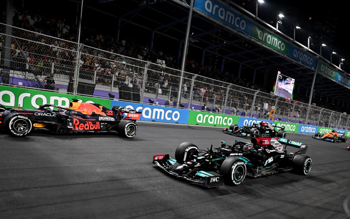 Red Bull's Max Verstappen in action with Mercedes' Lewis Hamilton and Mercedes' Valtteri Bottas during the race Pool via REUTERS/Andrej Isakovic