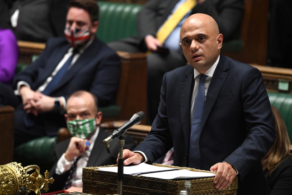 British Health Secretary Sajid Javid speaks on COVID-19 situation in Parliament in London, Britain December 8, 2021. UK Parliament/Jessica Taylor/Handout via REUTERS