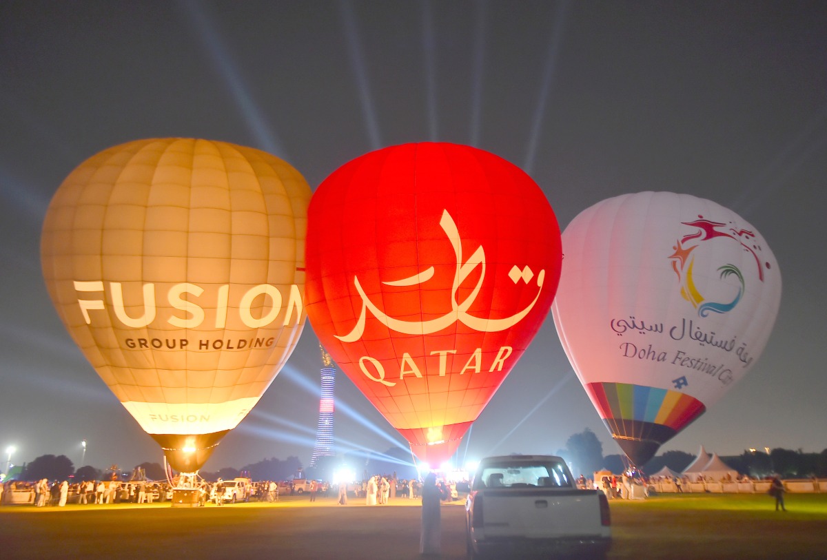 Hot air balloons are inflated during the 2nd Qatar Balloon Festival at Aspire Park, yesterday. Pic: Abdul Basit