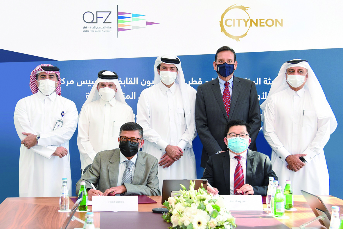 Minister of State and Chairman of QFZA H E Ahmad Al Sayed; Qatar Airways Group Chief Executive and Secretary-General of Qatar’s National Tourism Council H E Akbar Al Baker; Singapore’s Ambassador to Qatar H E Jai S Sohan and other senior officials during agreement signing ceremony held at Ras Bufontas Free Zone.