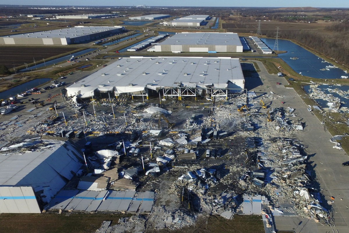 The site of a roof collapse at an amazon.com distribution centre a day after a series of tornadoes dealt a blow to several U.S. states, in Edwardsville, Illinois, U.S. December 11, 2021. REUTERS/Drone Base 