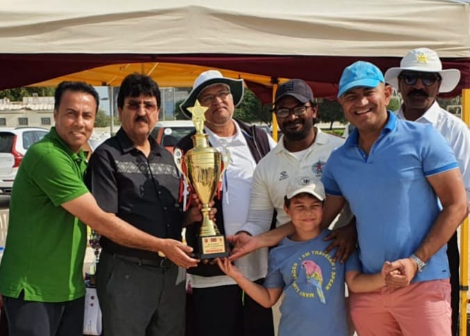 Qatar Cricket Association’s Domestic Cricket Head Gul Khan Jadoon presents the winner’s trophy to QIECO who won the Qatar Airways T20 Division C final at the West Bay Grounds.