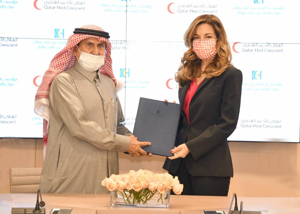 Chairperson of the Board of Trustees of KHCC, HRH Princess Ghida Talal and QRCS Secretary-General Ali bin Hassan Al Hammadi after signing the agreement.