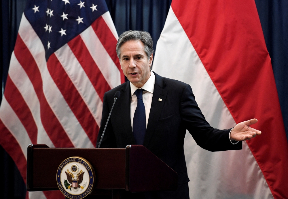 FILE PHOTO: U.S. Secretary of State Antony Blinken speaks to staff at the U.S. Embassy in Jakarta, Indonesia on December 14, 2021. Olivier Douliery/Pool via REUTERS