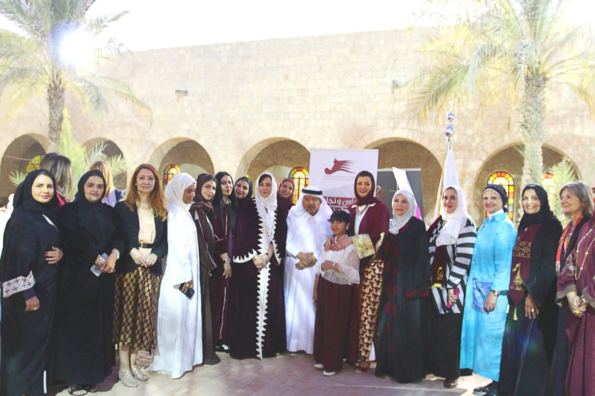 Qatari Businessmen Association’s (QBA) Chairman Sheikh Faisal bin Qassim Al Thani, Qatari Businesswomen Association (QBWA) Vice-President Aisha Al Fardan, and other QBWA members and guests, during the function. 