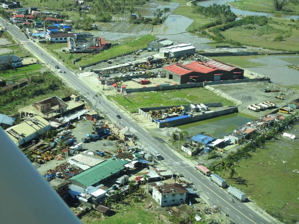 Aerial view showing damaged houses in Surigao City, Surigao Del Norte Province, Philippines, December 17, 2021. Picture taken December 17, 2021. Philippine Coast Guard/Handout via Reuters