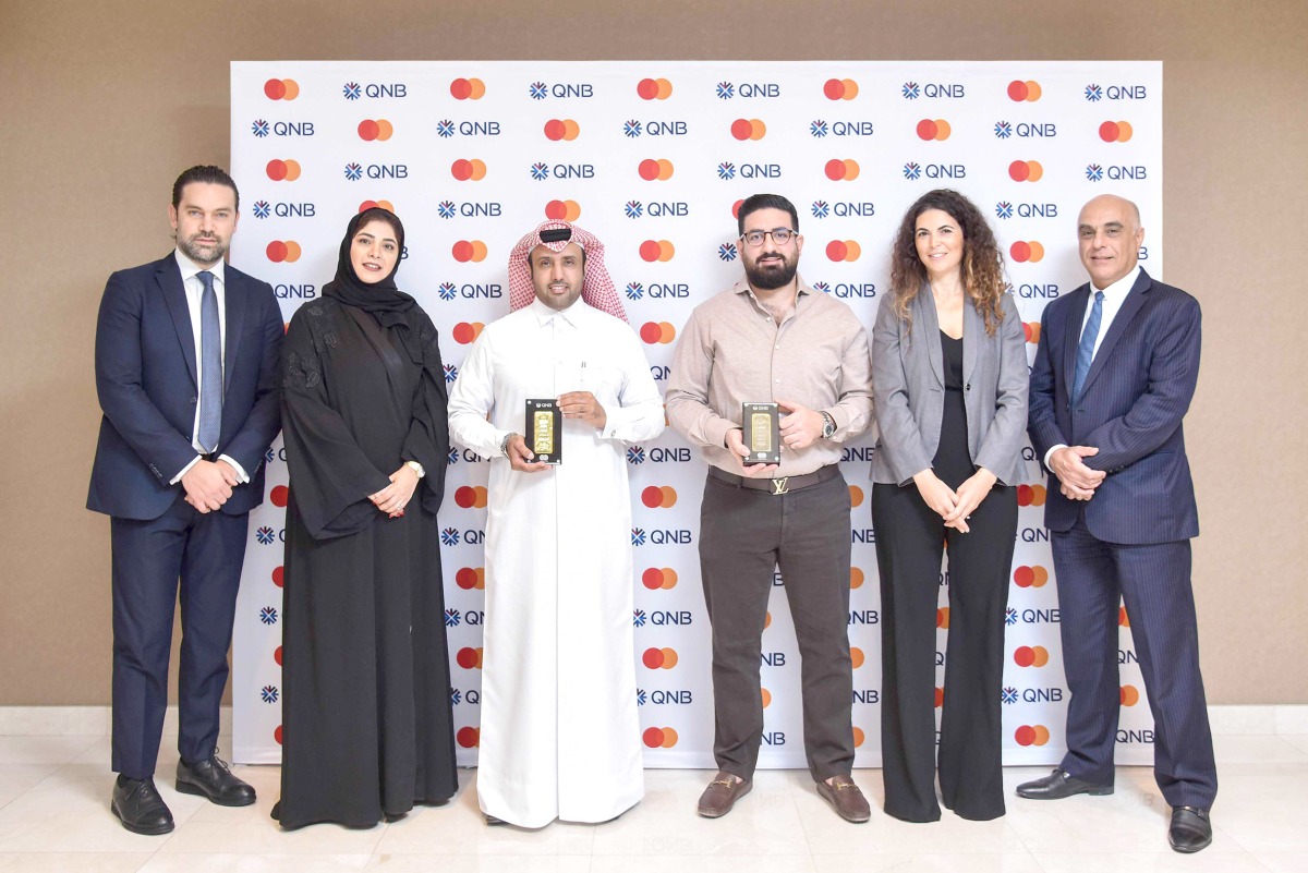 Officials with winners of mega campaign posing for the group photo.  